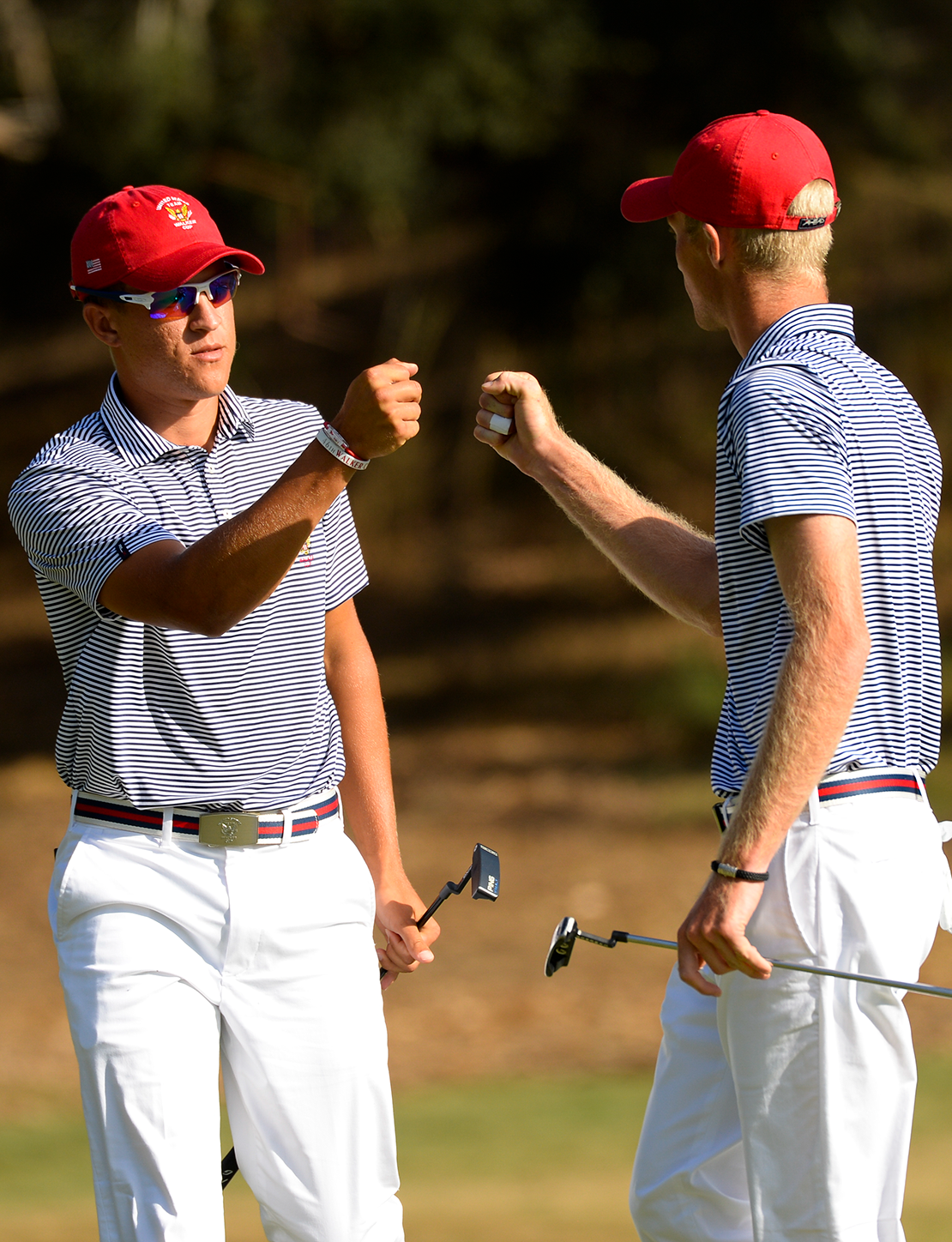 Fist bump two players